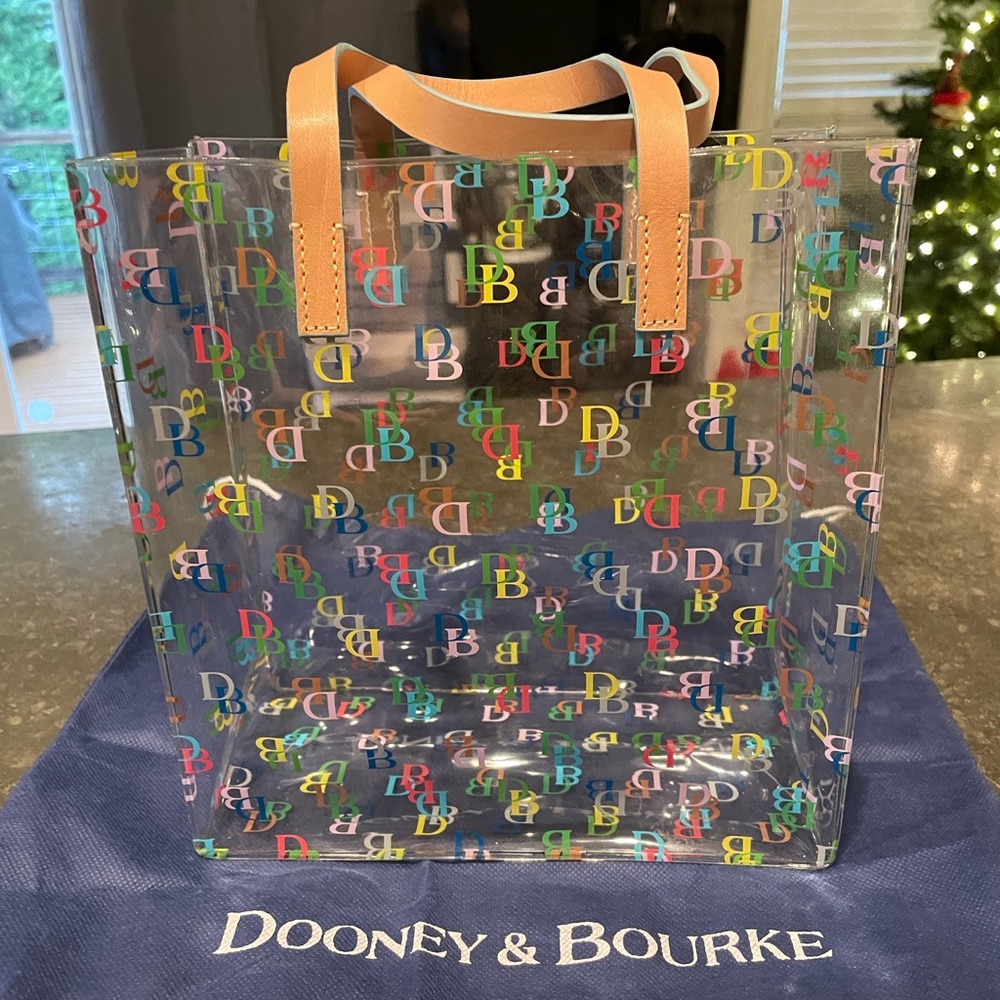 Dooney and Bourke small clear logo tote with leather handles NWOT